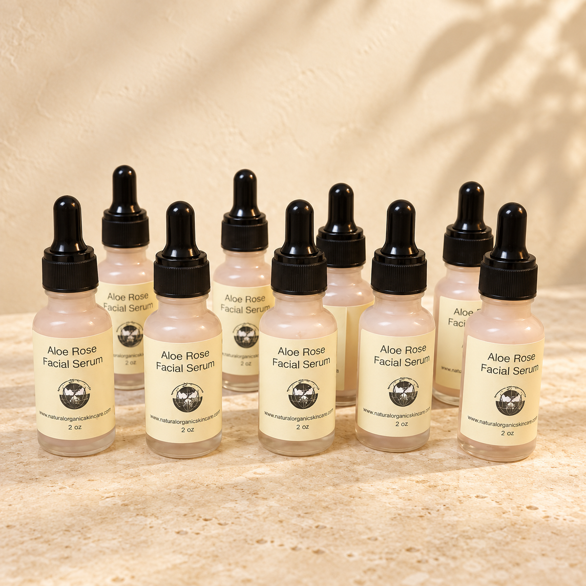 Aloe Rose Facial Serum in a warm luxury spa setting